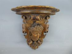 An Antique Carved Oak Wall Sconce