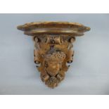 An Antique Carved Oak Wall Sconce