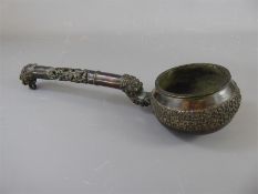 A Chinese Bronze Ladle.