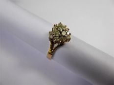 An 14-15ct Yellow Gold Heart-Shaped Diamond Cluster Ring