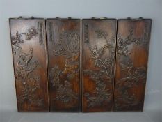 Four Chinese Wood-Carved Panels.