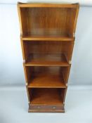 A Small Oak Waterfall Bookcase.