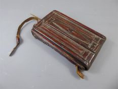 A 19th Century Islamic Tooled Calves Leather Qu'ran Case.