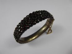 A Vintage Red Stone Bangle.