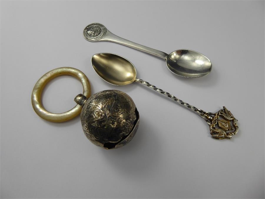 An Antique Silver and Mother of Pearl Rattle.