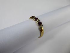 A Vintage 9ct Yellow Gold Ruby and Diamond Ring.