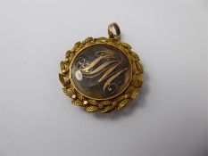 An Antique 14-15ct Gold Laurel Mourning Pendant.