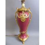 A Burgundy Porcelain and Gilt Lamp Stand