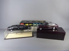 Two Die-Cast 1:18 Limousines.