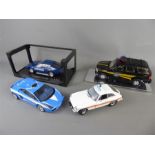 A Quantity of Die-cast 1:18 Police Cars.