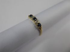 A 9ct Yellow Gold Diamond Ring.