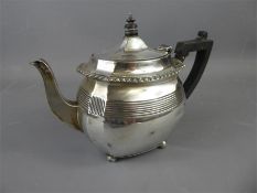 A Silver Bachelor Teapot.