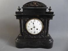 An Early 20th Century Black Marble Slate Mantel Clock.