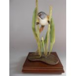 A Limited Edition Royal Worcester Bird Figurine.