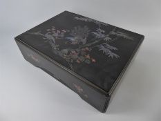 An Antique Chinese Lacquered Wood and Mother of Pearl Box