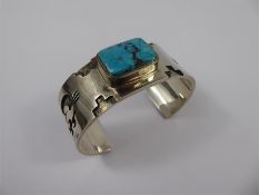 A Silver and Turquoise Navajo Bracelet