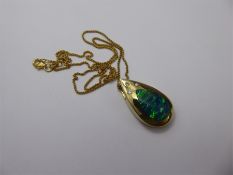 A 14ct Yellow Gold Opal and Diamond Pendant
