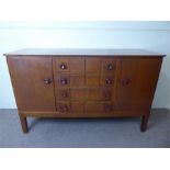 A Mid-20th Century Oak Cotswold School Sideboard