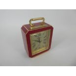 A Promotional 'Howard Miller' Red Enamel Quartz Clock