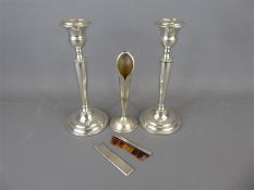 A Pair of Antique Silver Candle Sticks