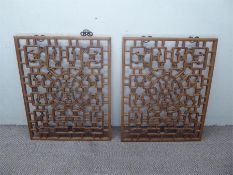 A Pair of Chinese Wooden Screens.