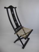 A Chinese Ebonised Folding Chair