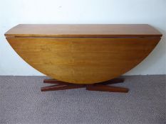 A Mid-20th Century Cotswold School Circular Dining Table