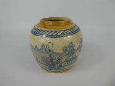 A Cream and Blue Stoneware Ginger Jar.