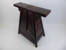 A 20th Century Chinese Teak Stool