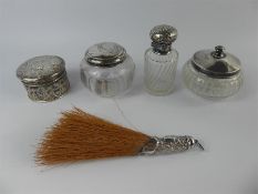 Four Cut-Glass and Silver Topped Vanity Jars