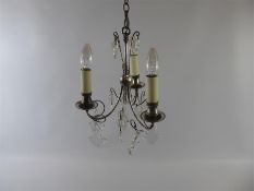 A Three Branch Chrome Crystal Chandelier