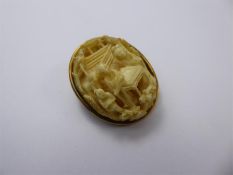 An Antique Chinese Ivory Carved Brooch.