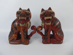 A Pair of Chinese Painted Tiger Bookends