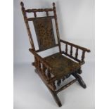 An Antique Child's Rocking Chair