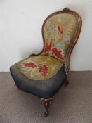 A Victorian Mahogany Framed Nursing Chair.