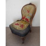 A Victorian Mahogany Framed Nursing Chair.