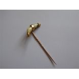 An Antique 18ct Tooth Tie Pin