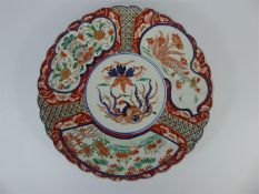 A Hand Painted Antique Japanese Imari Plate Depicting a Phoenix Bird and Flora