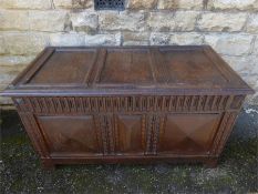 An Antique English Oak Panelled Coffer