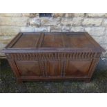 An Antique English Oak Panelled Coffer