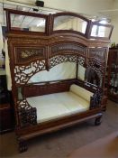 A Chinese Canopied Day Bed