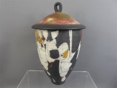 A Comical Ceramic Pot and Cover