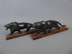 A Pair of Antique Horn Tiger and Lion Figures