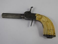 A 19th Century Ivory Handled Muff Pistol