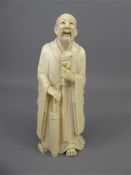 A Japanese Late Meiji Period Ivory Okimono