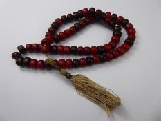 Beaded Red and Dark Brown Prayer Necklace, on a silk tassel