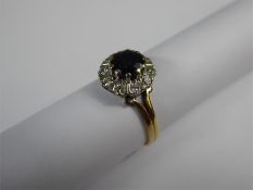 A Vintage 18 ct Yellow and White Gold Sapphire & Diamond Ring