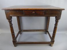 An Antique Tilt-top Oak Wine Table