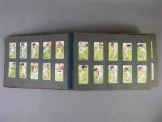 A Large Album of 1910 to 1920's Cigarette Cards