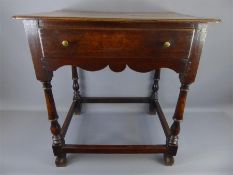 An Antique Oak Occasional Table